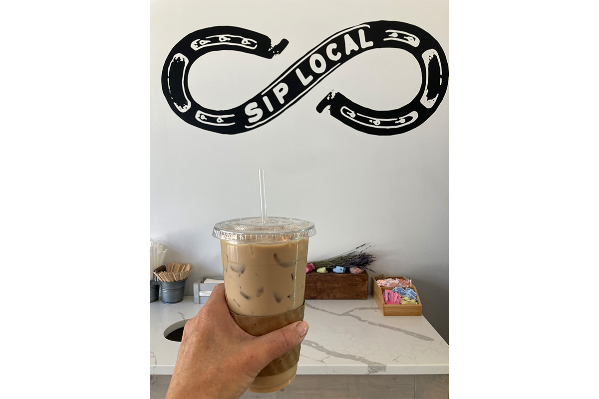 Laughing Horse coffee and local sign