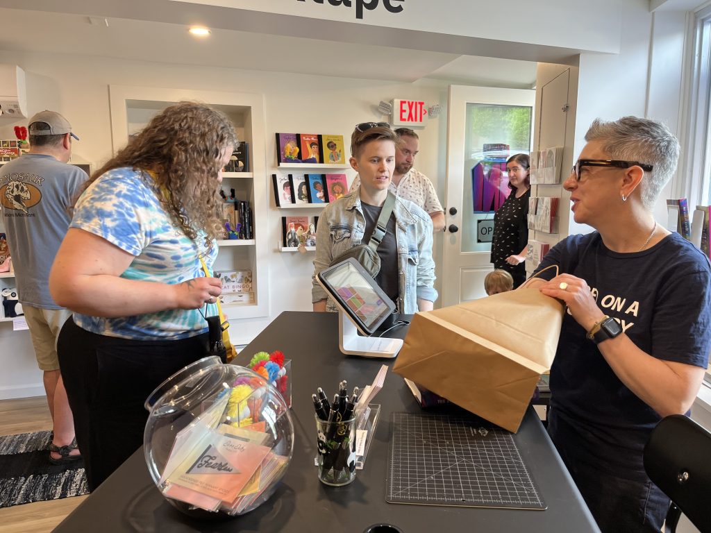 Allyson McCabe helping customers