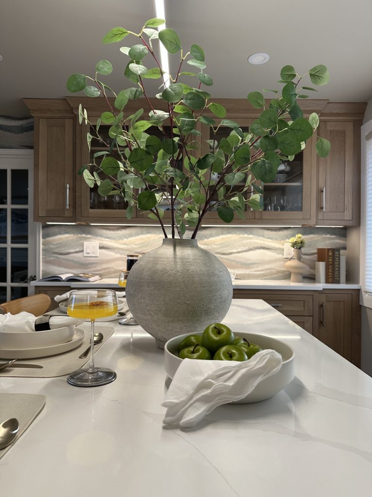 Kitchen with plant in the center styled by Carmen Henriquez-Cruz